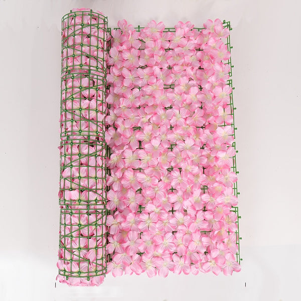 Mur végétal avec fleurs artificielles rose