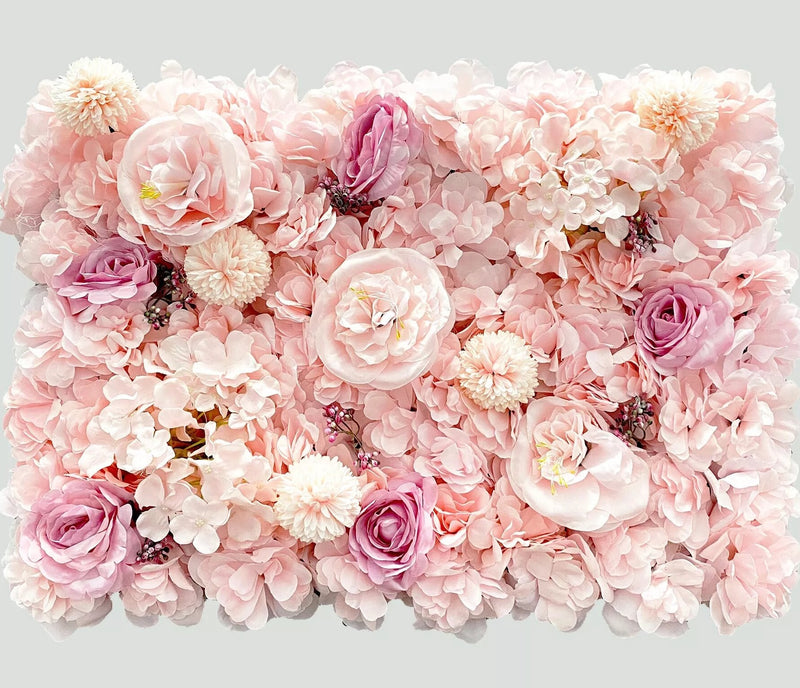 Mur végétal de fleurs roses poudrées 