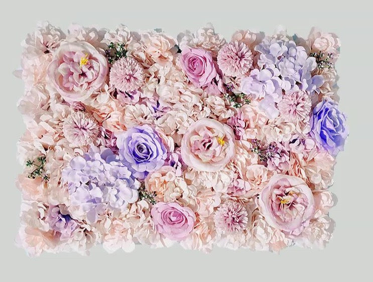 Mur végétal de fleurs roses poudrées et mauves 